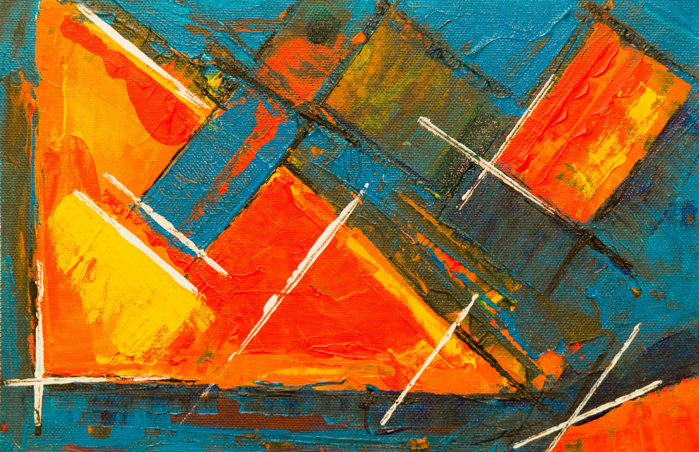 An abstract artwork showcasing a blend of orange, blue, and yellow hues, creating a lively and colorful composition.