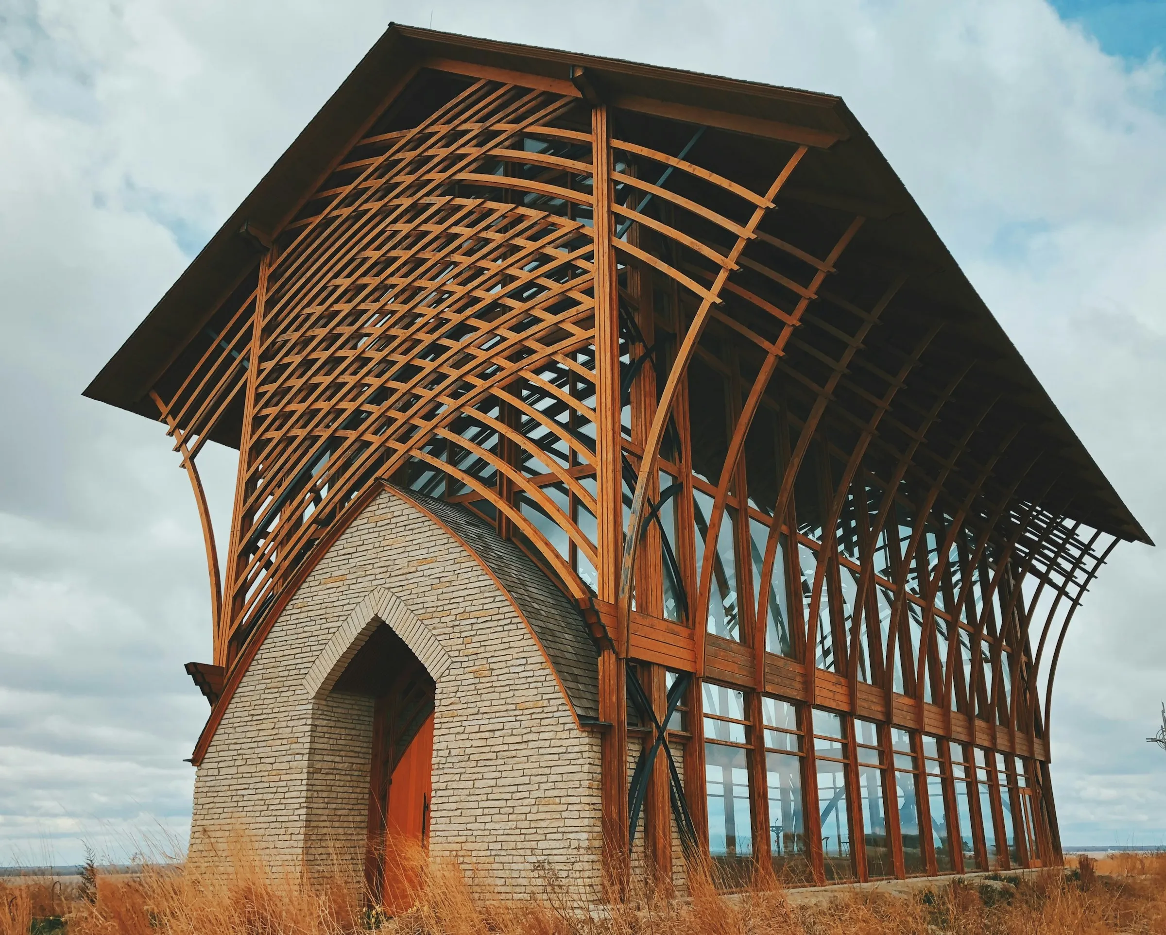 A wooden church building perched on a hill, symbolizing stability and faith, akin to resolving variables in Terraform.